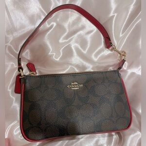 Coach Nolita 19 in signature canvas